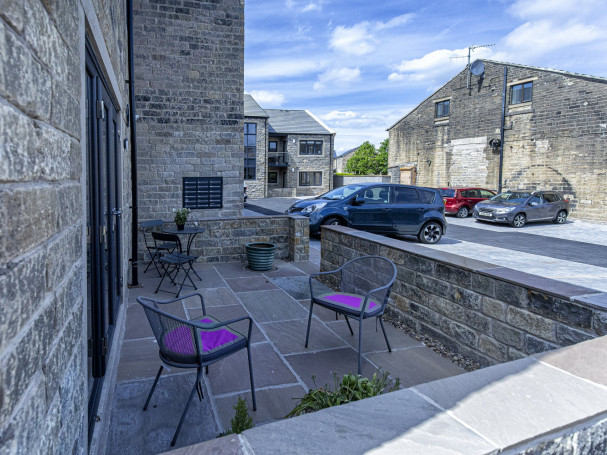 Outdoor private patio at ground floor apartment