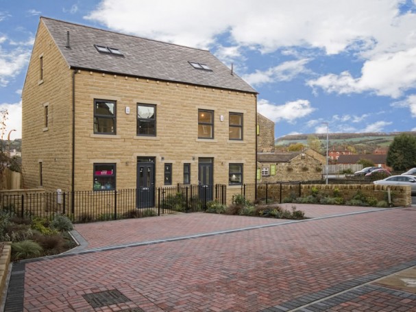 Homes at Bradshaw Gardens have landscaped gardens and parking.