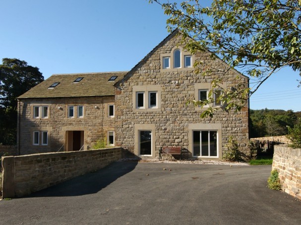 Grade II listed former cornmill converted into 4 spacious homes by Eastwood Homes.