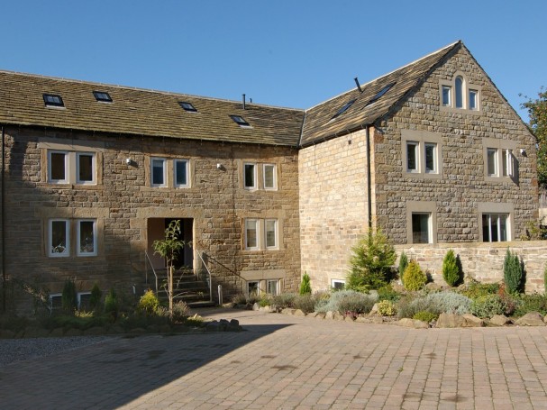 Grade II listed former cornmill converted into 4 spacious homes by Eastwood Homes.