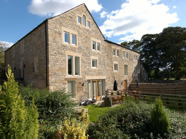 Grade II listed former cornmill converted into 4 spacious homes by Eastwood Homes.