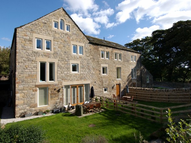 Grade II listed former cornmill converted into 4 spacious homes by Eastwood Homes.