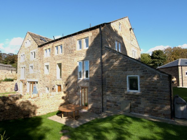 Grade II listed former cornmill converted into 4 spacious homes by Eastwood Homes.