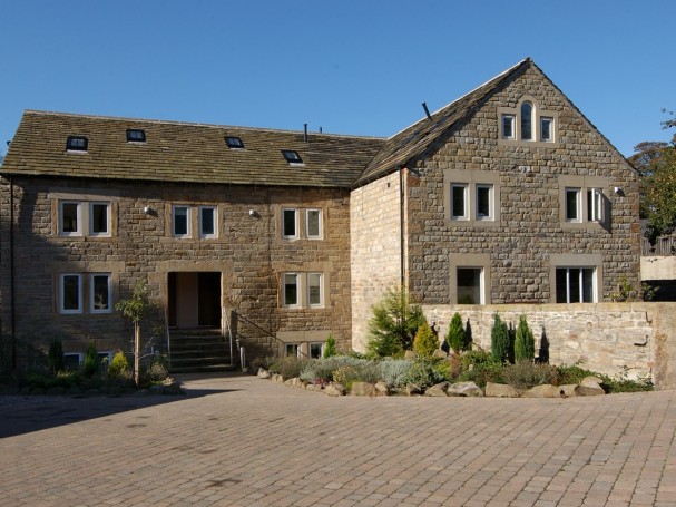 Grade II listed former cornmill converted into 4 spacious homes by Eastwood Homes.