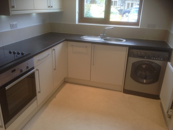 Kitchen equipped with all appliances.