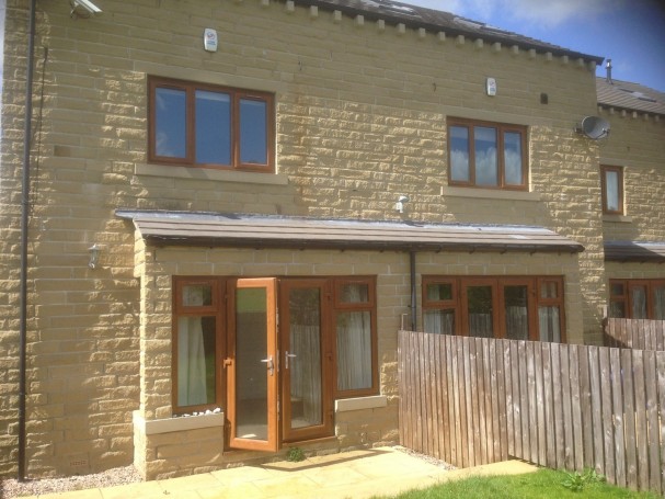 Rear of property showing French doors leading from living room. Rear of property showing French doors leading from living room.