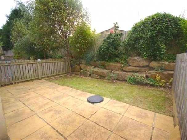 The 4 bed town house property has a spacious patio and garden. The 4 bed town house property has a spacious patio and garden.