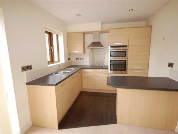 The property features a fully integrated kitchen. The property features a fully integrated kitchen.